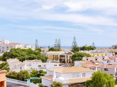 a view of a city with white buildings at AL - Apartamento Moura Praia in Vilamoura