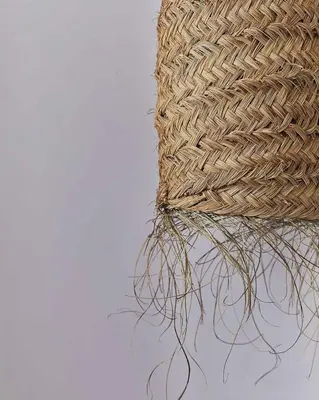 a wicker basket sitting on top of a wall at Casa Pateo in Albufeira