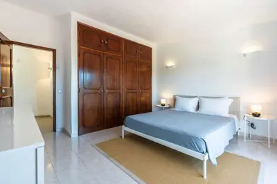 a bathroom with a sink and a mirror at Sunny Vilamoura Golf Villa with Private Pool in Quarteira