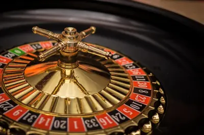 a close up of a roulette wheel on a table at Centralgarve - Cosy&Central 1bdrm in Vilamoura - Pateos da Marina in Vilamoura