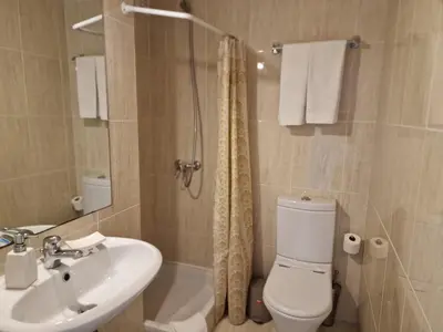 a bathroom with a sink and a toilet and a shower at Apartamentos Mar-Sol Villas in Vilamoura