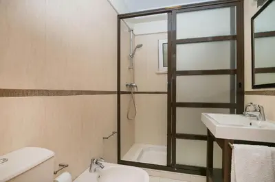 a bathroom with a shower and a toilet and a sink at ABF36V2 Charming 2 bdr villa located only a few mi in Albufeira
