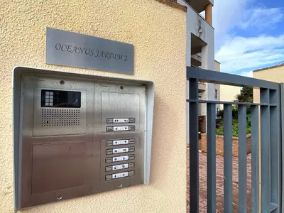 a building with a door with a sign on it at Albufeira Sunny Style With Pool by Homing in Albufeira