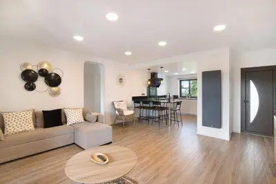 a living room with a couch and a table at Flat 2 Bedrooms Cunha in Albufeira