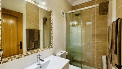 a bathroom with a sink and a shower at Bicos 7 by Check-in Portugal in Albufeira