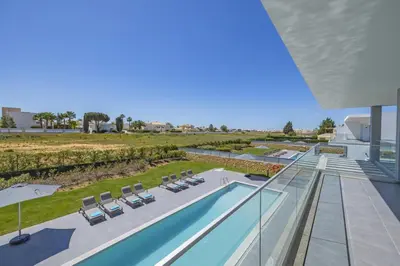 a view of the pool and patio of a villa at Villa Casa Lirio by Villa Plus in Galé