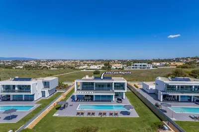 an aerial view of a house with a swimming pool at Villa Casa Magnolia by Villa Plus in Galé