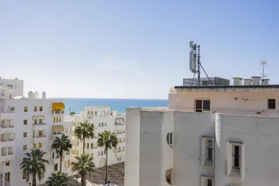 a view of the ocean from a building at Terracos de Quarteira 2 Red by Real Properties in Quarteira