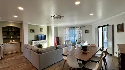 a living room with a couch and a table at Mourisca by Check-in Portugal in Vilamoura