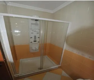 a shower with a control panel in a bathroom at Vila Bairos Apartment Vilamoura in Vilamoura