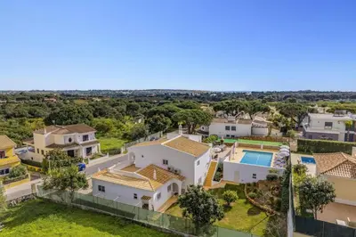 an aerial view of a house with a swimming pool at Villa Duas Sentinelas by Villa Plus in Cabeço de Câmara