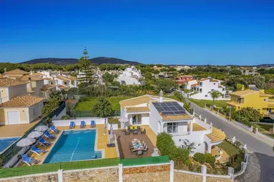 an aerial view of a house with a swimming pool at Villa Duas Sentinelas by Villa Plus in Cabeço de Câmara