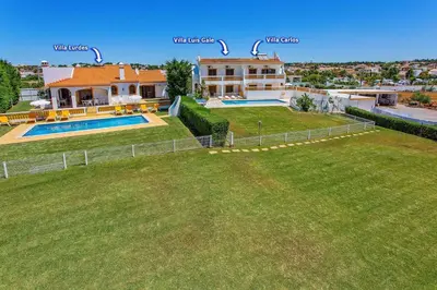 an aerial view of a house with a swimming pool at Villa Lurdes by Villa Plus in Galé