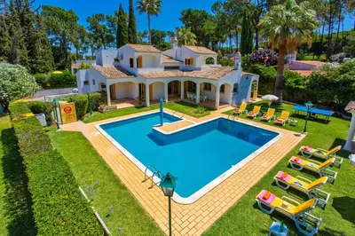 an aerial view of a house with a swimming pool at Villa Miralago by Villa Plus in Vilamoura