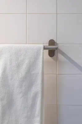 a towel hanging on a towel rack in a bathroom at #197 Casa Gili by Home Holidays in Albufeira