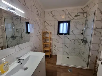 a bathroom with a tub and a sink and a shower at The Albufeira Concierge - Prime Beach Center L3 in Albufeira