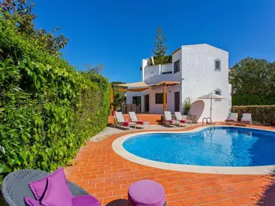 a white bathroom with a sink and a shower at Charming Vilamoura Villa Short Walk To Marina Villa O Clube 3 Bedrooms in Quarteira