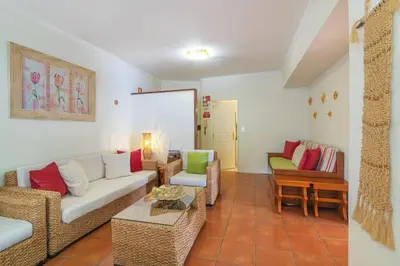 a living room with a couch and a table at Vilamoura M.M. Holidays T2 in Vilamoura