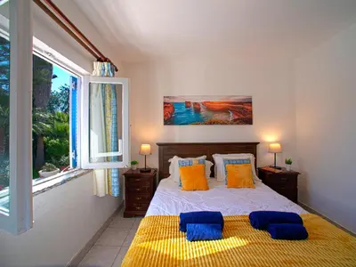 a bathroom with a shower and a sink and a tub at Villa Fernandes by Interhome in Albufeira