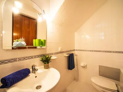 a bedroom with two twin beds and a window at Villa Maria by Interhome in Albufeira