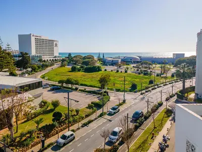 an aerial view of a city street with cars parked at Vilamoura Sea View in Vilamoura