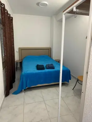 a shower with a glass door in a bathroom at Apartment near the ocean Rua 5 de Outubro in Albufeira