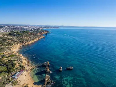 an aerial view of a beach with rocks in the water at Apart Ocean View in Albufeira