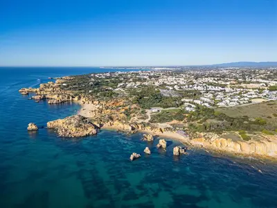 an aerial view of a rocky island in the ocean at Apart Ocean View in Albufeira