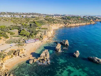 an aerial view of a beach with rocks in the water at Apart Ocean View in Albufeira