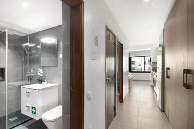 a bathroom with a toilet and a sink and a mirror at Cosy Loft in Vilamoura in Vilamoura
