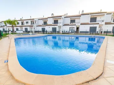 a large swimming pool in front of a building at Magnólia AB House by Stay ici Algarve Holiday Rental in Albufeira