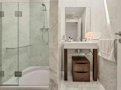 a bathroom with a tub and a sink and a shower at Villa Laguna 25 by Stay ici Algarve Holiday Rental in Quarteira
