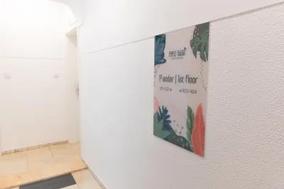 a poster on a wall in a room at Faro Guest Apartments in Faro
