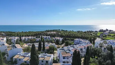 an aerial view of houses and the ocean at Welcoming Oasis 500m Beach AC Wi-Fi Pool Balcony in Albufeira