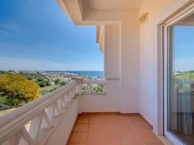 a living room with a couch and a coffee table at Holiday Home Cerro Aguia AM V2 - VIP Properties by Interhome in Albufeira
