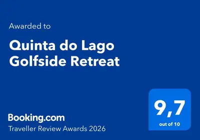 a blue sign with the words quinua do lagosa gearchrocket retreat at Quinta do Lago Golfside Retreat in Quinta do Lago