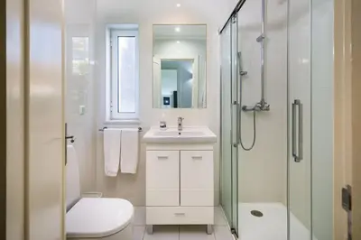 a bathroom with a toilet and a sink and a shower at Charming Vale Do Lobo Villa 4 Bedrooms Villa Quadradinhos 22 Private Pool in Almancil