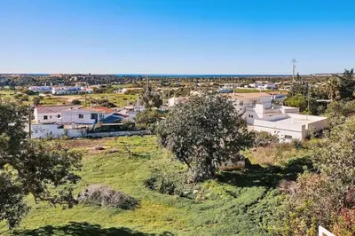 an aerial view of a city with houses and trees at NEU - Casa Tina mit Meerblick und Pool in Guia