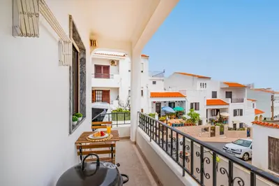 a balcony with a view of a city at Mar&Mar Old Town 2 Bedroom Apartment in Albufeira