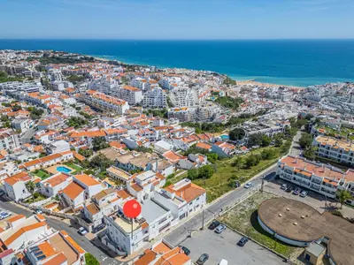 an aerial view of a city and the ocean at Mar&Mar Old Town 2 Bedroom Apartment in Albufeira
