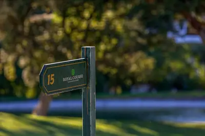 a sign in the grass with a sign that says buildings at Sunny Haven Apartment Vilamoura in Vilamoura