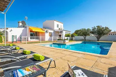 a villa with a swimming pool and a house at Casa do Engenho in Galé