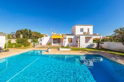 a large swimming pool in front of a house at Casa do Engenho in Galé
