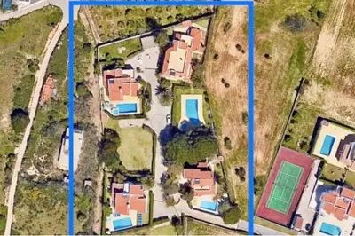 an aerial view of a yard with houses at Villa Mirasol - Relaxed Private Villa in Albufeira