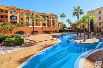 an aerial view of a campus with buildings at The Prime @ The Residences Vilamoura in Quarteira