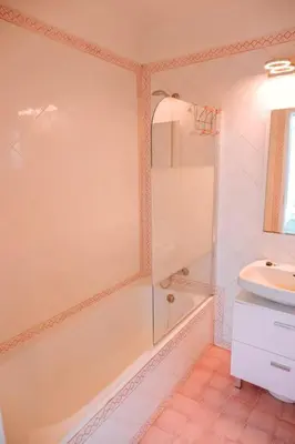 a bathroom with a shower and a sink at Villa Coelha - Algarve's Pearl in Albufeira