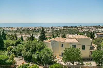 a house with a view of a city at Villa Cerrinho in Albufeira