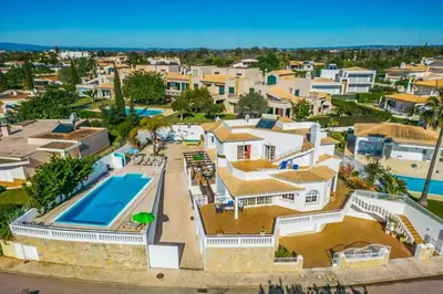 an aerial view of a villa with a swimming pool at Casa Oliveira in Albufeira