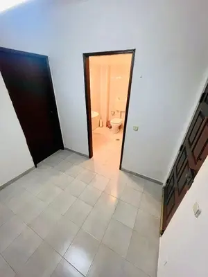 an empty room with a toilet and a doorway at Amazing Studio Flat Albufeira in Albufeira