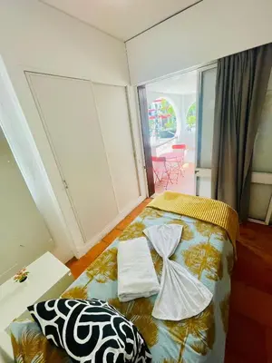 a bedroom with a bed with towels on it at Boutique Two Bedrooms Apartament Praia Da Oura in Albufeira